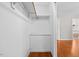 Walk-in closet with wood shelving and hanging rod at 521 N Franklin Dr, Sanford, NC 27330