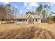 Brick and siding home with a covered front porch at 521 N Franklin Dr, Sanford, NC 27330