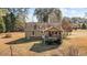 Rear view of house, showcasing a deck and gazebo at 521 N Franklin Dr, Sanford, NC 27330
