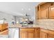 Kitchen island with granite countertop and stainless steel appliances at 521 N Franklin Dr, Sanford, NC 27330