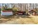 Storage shed, carport, and workshop in the backyard at 521 N Franklin Dr, Sanford, NC 27330