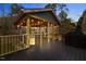 Covered deck with a pergola at night at 521 N Franklin Dr, Sanford, NC 27330