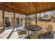 Covered deck with a pergola, grill and fire pit at 521 N Franklin Dr, Sanford, NC 27330