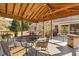 Covered deck with a pergola and outdoor seating at 521 N Franklin Dr, Sanford, NC 27330