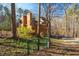 Exterior view of a charming house nestled in the woods at 5701 Cascade Dr, Chapel Hill, NC 27514