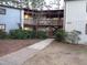 Exterior view of condo building with walkway and landscaping at 626 Pine Ridge Pl Pl, Raleigh, NC 27609