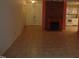 Living room with fireplace and view into kitchen at 626 Pine Ridge Pl Pl, Raleigh, NC 27609