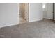 Bright bedroom with ensuite bathroom featuring a glass shower and neutral wall color at 708 Georgias Landing Pkwy # 14, Raleigh, NC 27603