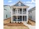 Charming two-story home with a covered front porch and nicely landscaped yard at 708 Georgias Landing Pkwy # 14, Raleigh, NC 27603