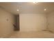 Unfinished basement featuring white walls, concrete floors, and ample space for customization at 7113 Hubner Pl # 20, Cary, NC 27519