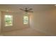 Bedroom featuring a modern ceiling fan and abundant natural light at 7113 Hubner Pl # 20, Cary, NC 27519