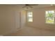 Bedroom with two windows offering pleasant neighborhood views at 7113 Hubner Pl # 20, Cary, NC 27519