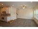 Open-concept living area with wood-look floors and ample natural light at 7113 Hubner Pl # 20, Cary, NC 27519