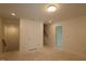 Unfinished room showcases ample space with a visible staircase at 7113 Hubner Pl # 20, Cary, NC 27519