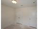 Unfinished room with dual closets and ample space for storage or customization at 7113 Hubner Pl # 20, Cary, NC 27519