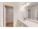 Modern bathroom features a white vanity, quartz countertop, and walk-in closet at 7117 Hubner Pl # 22, Cary, NC 27519