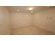 Spacious bedroom featuring bare floor and recessed lighting at 7117 Hubner Pl # 22, Cary, NC 27519