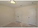 Bedroom featuring closet with double doors and flush ceiling light at 7117 Hubner Pl # 22, Cary, NC 27519