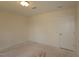 Neutral bedroom with overhead lighting and a door at 7117 Hubner Pl # 22, Cary, NC 27519