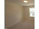 Bedroom with a window offering natural light and backyard views at 7117 Hubner Pl # 22, Cary, NC 27519