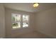 Bedroom with backyard view from the double windows at 7117 Hubner Pl # 22, Cary, NC 27519