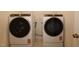 Laundry room featuring new side-by-side Whirlpool washer and dryer at 7117 Hubner Pl # 22, Cary, NC 27519