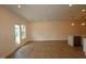 Open-concept living room featuring hard wood floors and lots of natural light at 7117 Hubner Pl # 22, Cary, NC 27519