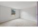 Simple bedroom with carpet and a window at 7228 Pecan Tree St, Willow Springs, NC 27592