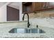Modern kitchen sink with black gooseneck faucet at 7228 Pecan Tree St, Willow Springs, NC 27592