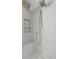 Luxurious shower with dual shower heads and built-in seat at 7228 Pecan Tree St, Willow Springs, NC 27592