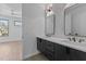 Modern bathroom with double vanity and dark cabinetry at 808 Culpepper Ln, Raleigh, NC 27610