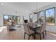 Bright dining area with hardwood floors and large windows at 808 Culpepper Ln, Raleigh, NC 27610