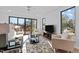 Living area with hardwood floors, sliding doors, and a cozy atmosphere at 808 Culpepper Ln, Raleigh, NC 27610