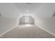 Expansive unfinished attic space ready for customization, with exposed beams at 85 Arbor Dr, Youngsville, NC 27596