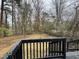 Spacious backyard with a deck and a wooded view at 905 Corona St, Durham, NC 27707