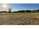 Property lot with distant view of houses and open land at 93 Faucette Dr, Selma, NC 27576