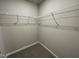 Walk-in closet with wire shelving at 93 Faucette Dr, Selma, NC 27576