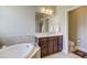 Elegant bathroom with soaking tub and double vanity at 1016 Dozier Way, Cary, NC 27518