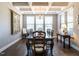 Spacious dining area with hardwood floors, coffered ceiling, and a lovely tapestry at 13 Needham Ln, Clayton, NC 27527
