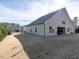 House exterior showcasing backyard and landscaping at 13 Needham Ln, Clayton, NC 27527