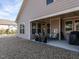 House exterior showcasing backyard patio, landscaping, and grill at 13 Needham Ln, Clayton, NC 27527