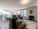 Open living space with kitchen, fireplace, and seating area at 13 Needham Ln, Clayton, NC 27527