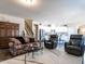 Spacious living room with hardwood floors and open floor plan at 13 Needham Ln, Clayton, NC 27527