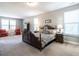 Large main bedroom with carpeted floors and a king-size bed at 13 Needham Ln, Clayton, NC 27527