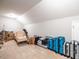 Unfurnished storage room with luggage and various storage containers at 13 Needham Ln, Clayton, NC 27527