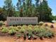 Ground-level view of Ryan's Crossing community entrance sign at 20 Lila Dr, Pittsboro, NC 27312