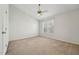 Bedroom with carpeted floors, neutral walls, and ample natural light at 2031 Rivergate Rd # 105, Raleigh, NC 27614