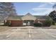 Community pool entrance with parking and shaded breezeway at 2031 Rivergate Rd # 105, Raleigh, NC 27614