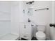 Clean bathroom with white vanity and shower at 213 Drew St, Louisburg, NC 27549