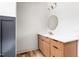 Modern bathroom with wooden vanity and gold fixtures at 250 Ellington Rd, Graham, NC 27253